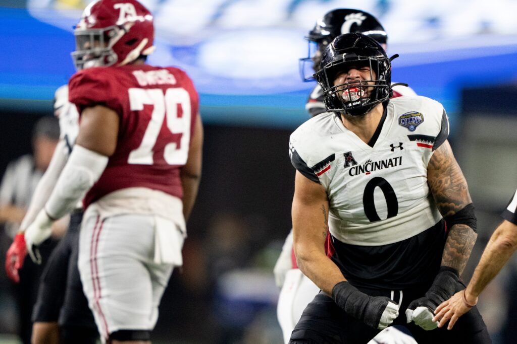 Cincinnati Bearcats linebacker Darrian Beavers (0) reacts to a defensive stop in the second half the NCAA Playoff Semifinal at the Goodyear Cotton Bowl Classic on Friday, Dec. 31, 2021, at AT&T Stadium in Arlington, Texas. Alabama Crimson Tide defeated Cincinnati Bearcats 27-6.