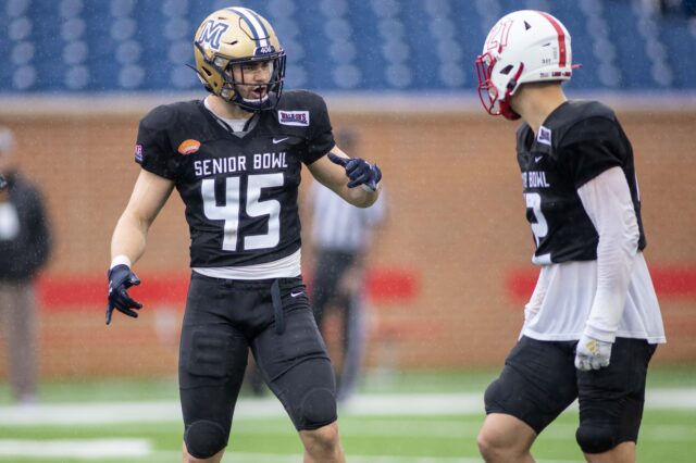 National squad linebacker Troy Andersen of Montana State (45) talks with National squad linebacker Sterling Weatherford of Miami (OH) (12) during National team practice for the 2022 Senior Bowl at Hancock Whitney Stadium.