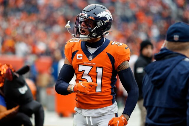 Denver Broncos safety Justin Simmons (31) reacts after a play in the first quarter against the Washington Football Team at Empower Field at Mile High.