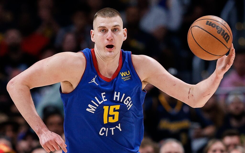 Nikola Jokic dribbles up court. Credit: Isaiah J. Downing, USA TODAY Sports.