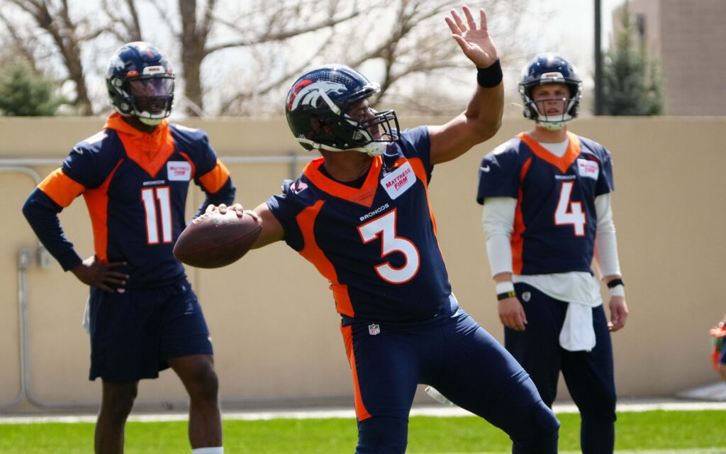 Russell Wilson throws in practice. Credit: Ron Chenoy, USA TODAY Sports.