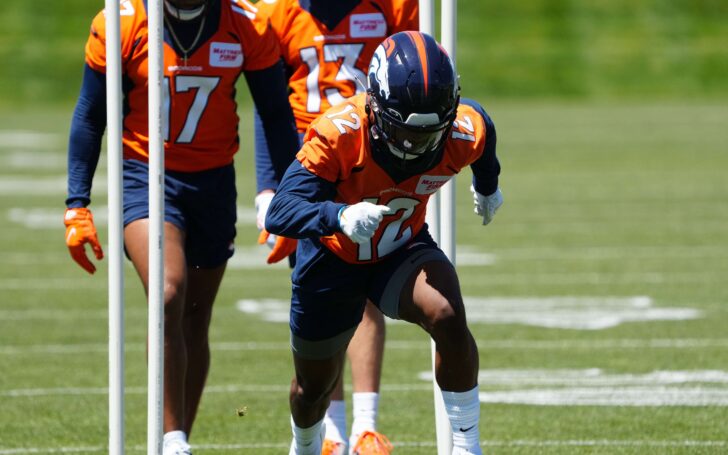 Montrell Washington (12) runs through drills at Broncos minicamp on Saturday, May 14. Credit: Ron Chenoy, USA TODAY Sports.