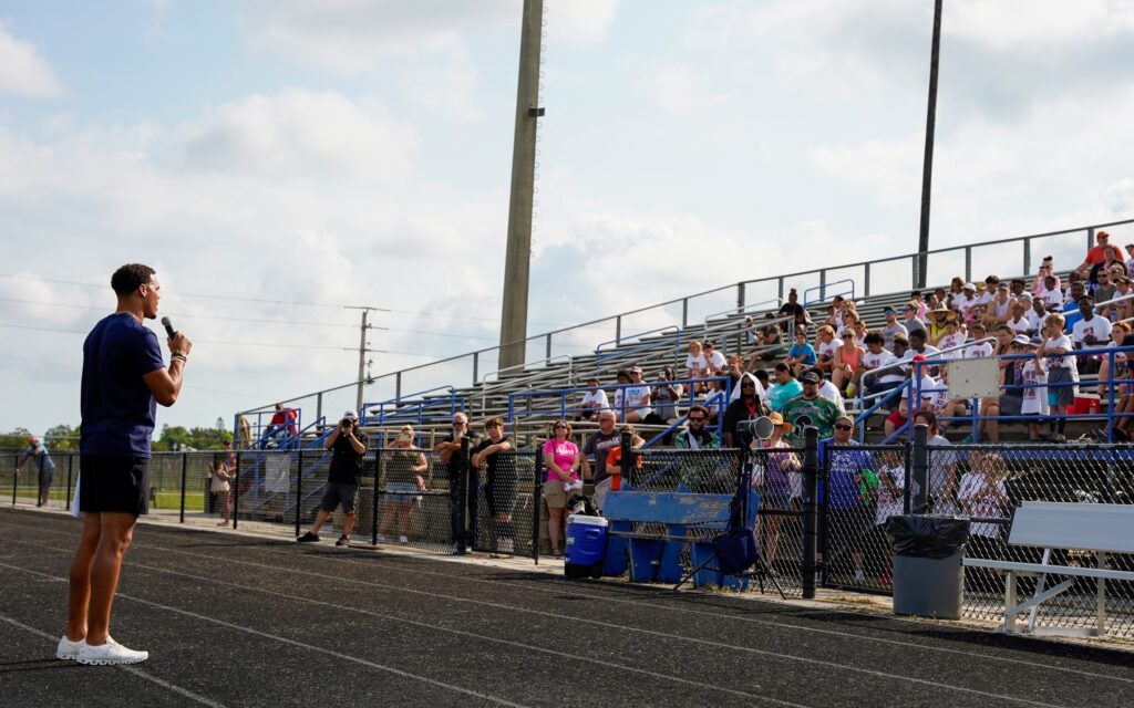 Justin Simmons speaks to kids at his Justin Simmons football camp. Credit: Rich West, special to USA TODAY Sports.