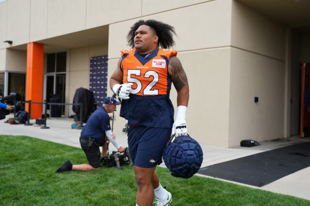 Denver Broncos guard Netane Muti (52) during training camp at the UCHealth Training Center.