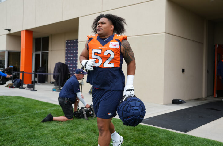 Denver Broncos guard Netane Muti (52) during training camp at the UCHealth Training Center.