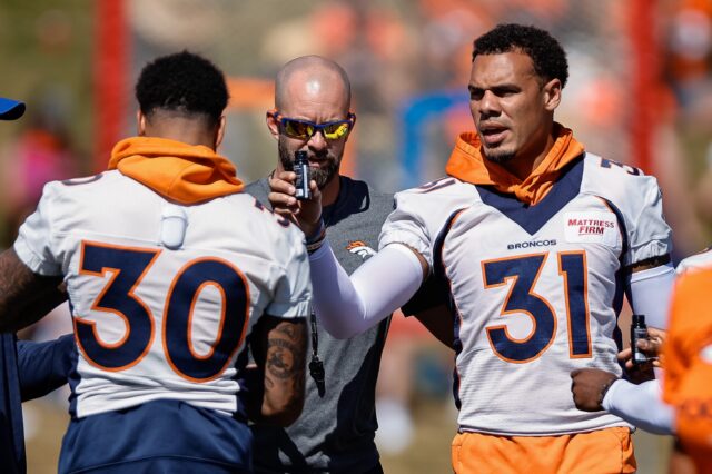 Justin Simmons (31) with younger safety Caden Sterns (30) at training camp. Credit: Isaiah J. Downing, USA TODAY Sports.