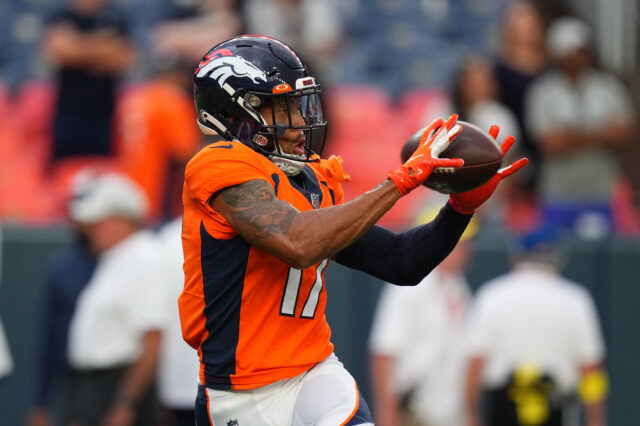 Denver Broncos wide receiver Jalen Virgil (17) warms up before the preseason game against the Dallas Cowboys at Empower Field at Mile High.