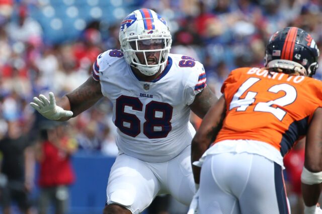 Bills right tackle Bobby Hart (68) blocks Denver Broncos linebacker Nik Bonitto (42) at the line during the Bills preseason game against Denver Saturday, Aug. 20, 2022 at Highmark Stadium.