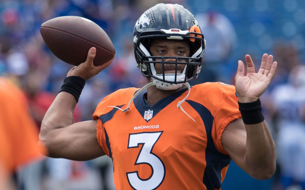 Russell Wilson in pregame warmups in Week 2 of the preseason. Credit: Mark Konezny, USA TODAY Sports.