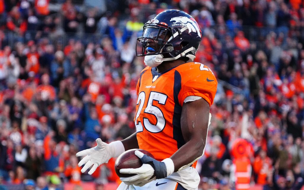 Melvin Gordon celebrates a touchdown. Credit: Ron Chenoy, USA TODAY Sports.