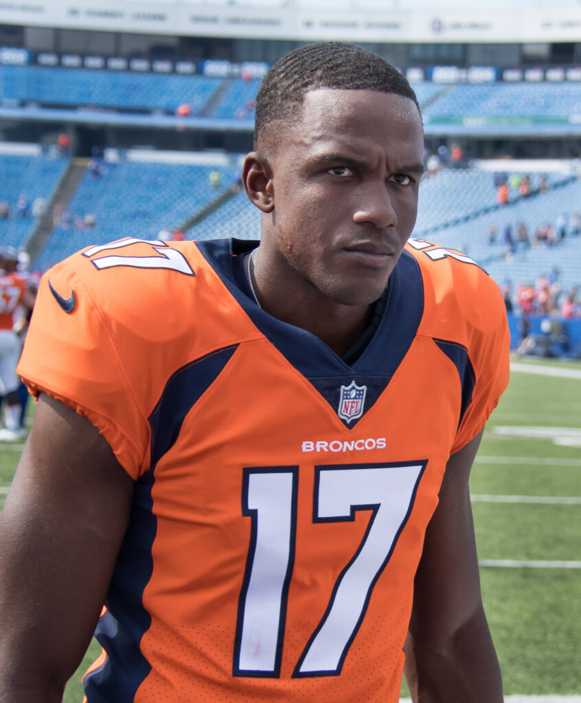 Denver Broncos punter Corliss Waitman (17) leaves the field after a pre-season game against the Buffalo Bills at Highmark Stadium.