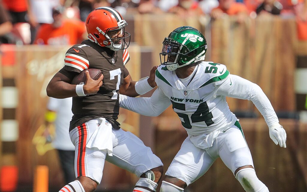 Jacob Martin (54) rushes Jacoby Brissett in Sept. 2022 while still with the New York Jets. Credit: Dave Matstruzo, USA TODAY Sports.