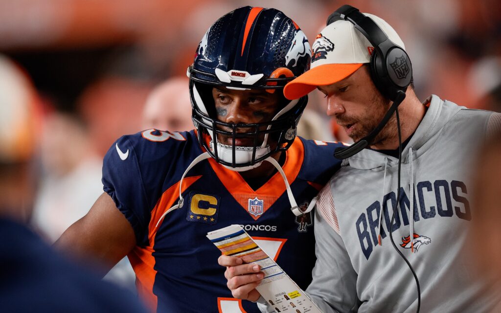 Russell Wilson and Klint Kubiak on the sideline during the Broncos - 49ers game in September, 2022. Credit: Isaiah J. Downing, USA TODAY Sports.