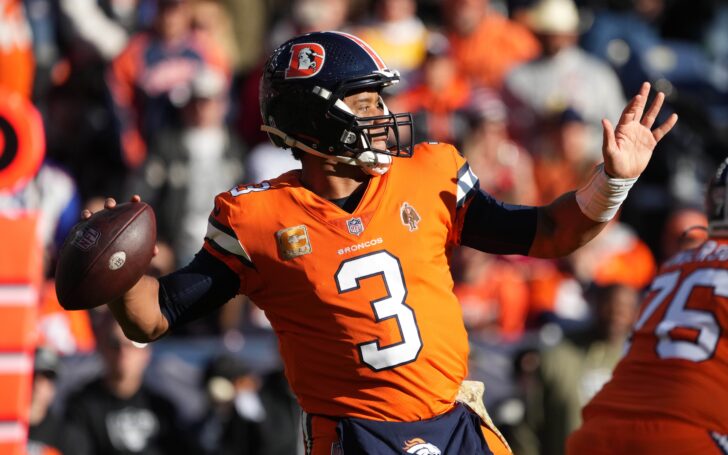 Russell Wilson throws against the Raiders. Credit: Ron Chenoy, USA TODAY Sports.