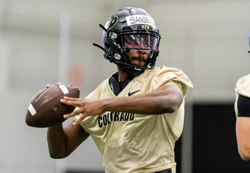 CU Buffs quarterback Shedeur Sanders drops back to pass the ball during Colorado Buffaloes Spring Practice.