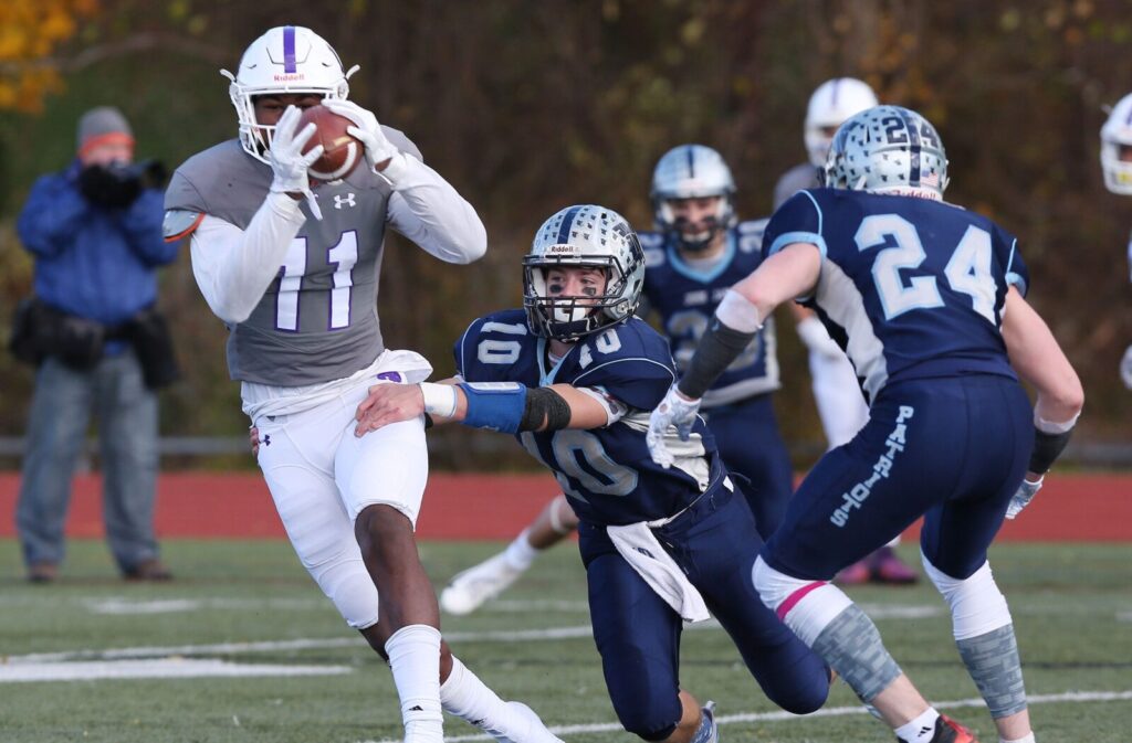 Colorado Buffaloes' DE Khairi Manns (11) catches a first half pass against John Jay during the Section 1 championship game at Mahopac High School Nov. 3, 2018.