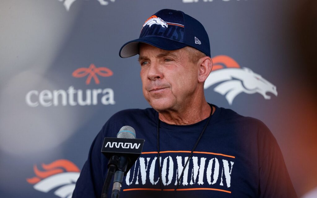 Sean Payton at the podium after Denver Broncos Training Camp practice.