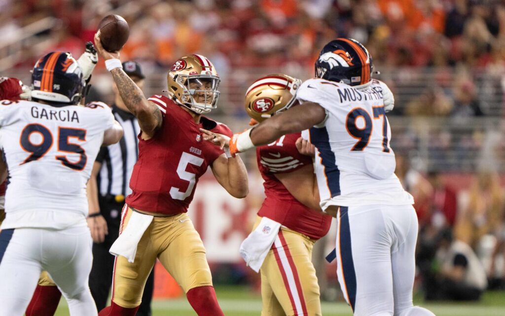 Trey Lance throws against the Broncos in Week 2 of preseason.