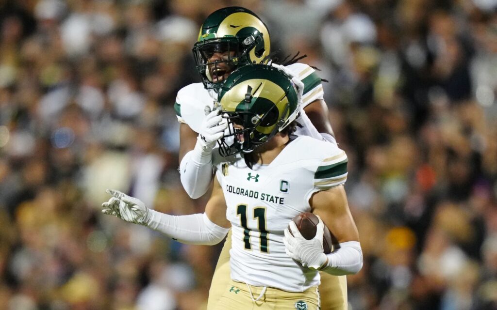 Henry Blackburn (11) celebrates an interception in the Rocky Mountain Showdown.