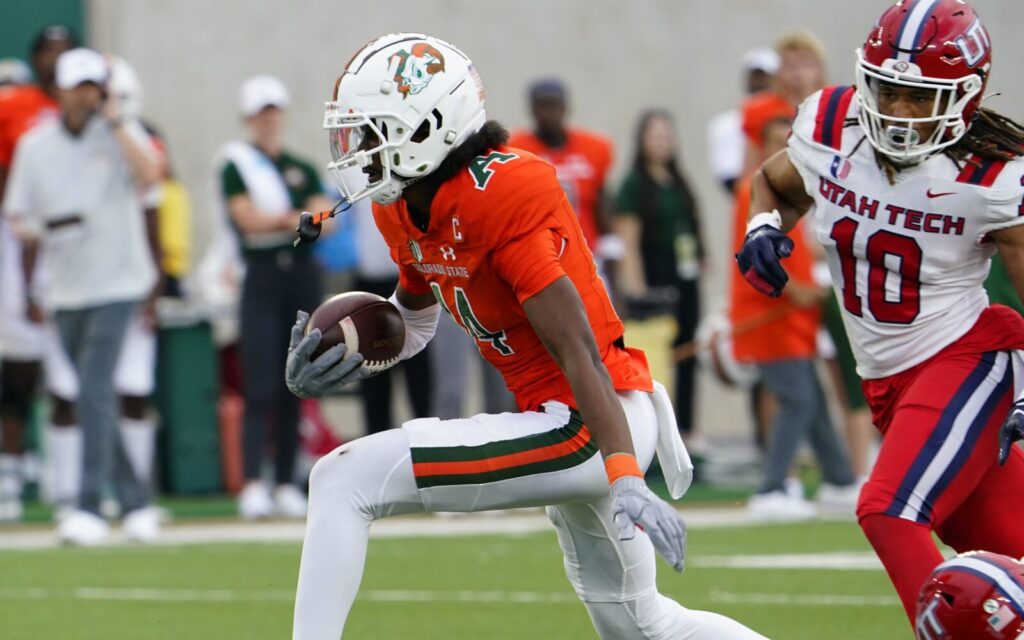 Tory Horton runs for a first down against Utah Tech.