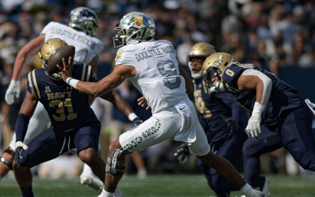 Air Force's Zac Larrier pitches the ball vs. Navy.