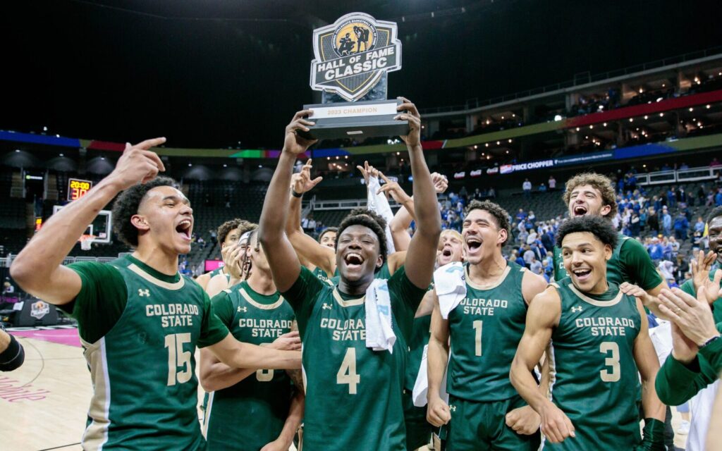 Isaiah Stevens and CSU lift trophy on Thanksgiving Day.