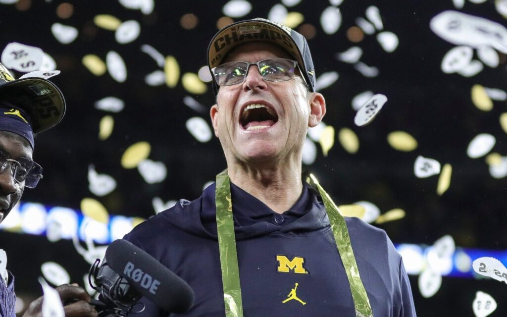 Jim Harbaugh celebrating the National Championship.