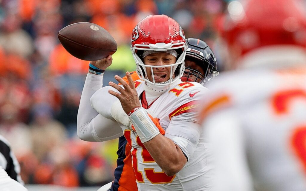 Baron Browning strips Patrick Mahomes.