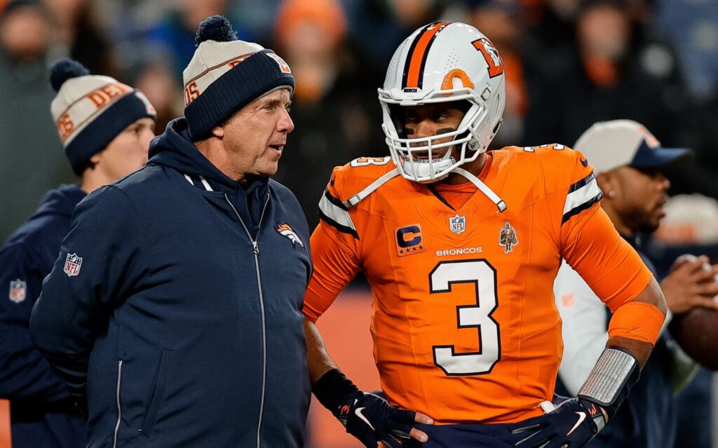 Sean Payton and Russell Wilson on the Broncos sideline.