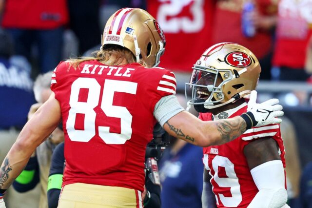 George Kittle and Deebo Samuel celebrate.