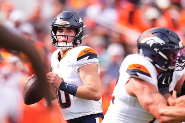 Bo Nix searches for an open receiver.