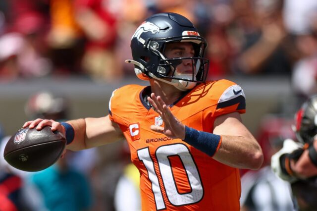 Bo Nix throws vs Tampa Bay.