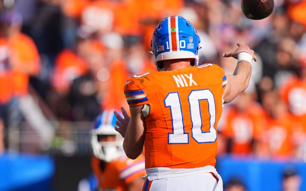 Bo Nix throws last week against the Raiders.