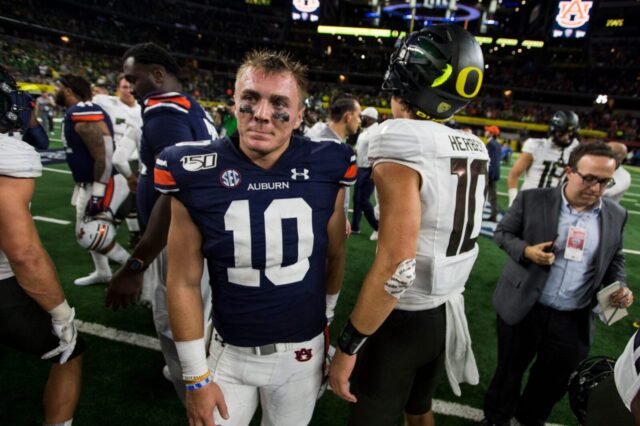 Auburn quarterback Bo Nix (10) shakes hands with Oregon quarterback Justin Herbert (10) after the game at AT&T Stadium in Arlington, Texas, on Saturday, Aug. 31, 2019. Auburn defeated Oregon 27-21.