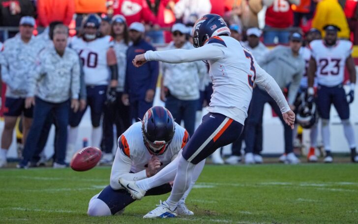 Will Lutz kicking the field goal that was blocked.