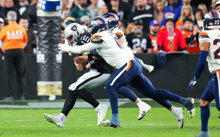 Jonathon Cooper and Cody Barton sack Gardner Minshew.