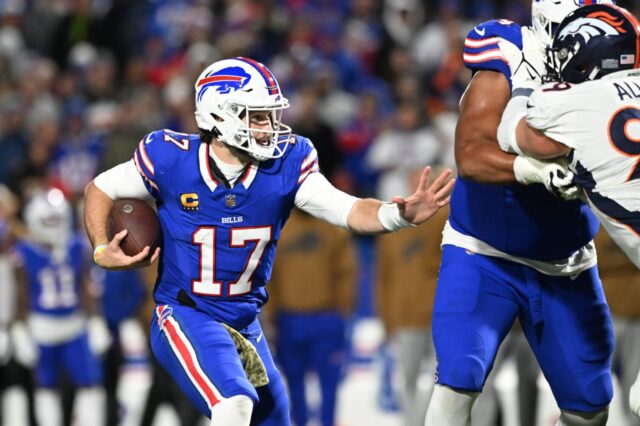 Josh Allen runs against the Broncos in 2023.