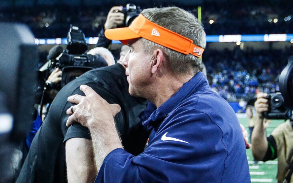 Sean Payton hugs Dan Campbell after their game in 2023.