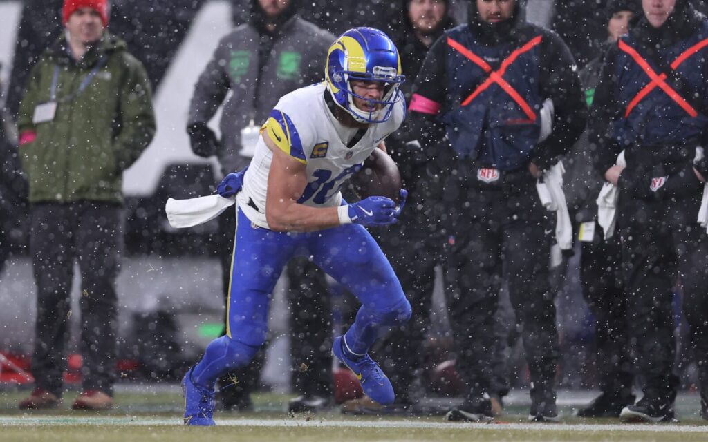 Cooper Kupp runs in the snow.