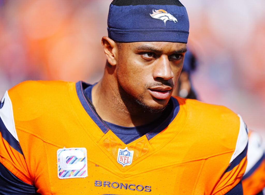 Oct 13, 2024; Denver, Colorado, USA; Denver Broncos cornerback Pat Surtain II (2) before the start of the first quarter against the Los Angeles Chargers at Empower Field at Mile High. Mandatory Credit: Ron Chenoy-Imagn Images