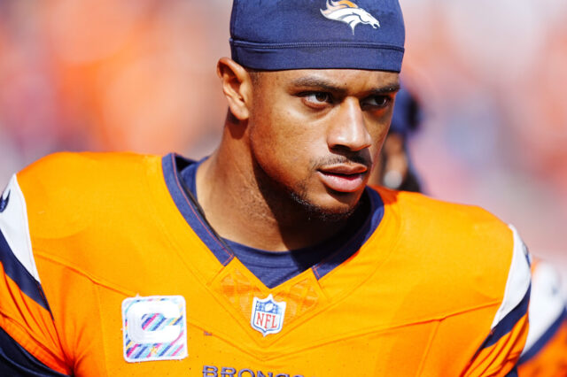 Oct 13, 2024; Denver, Colorado, USA; Denver Broncos cornerback Pat Surtain II (2) before the start of the first quarter against the Los Angeles Chargers at Empower Field at Mile High. Mandatory Credit: Ron Chenoy-Imagn Images