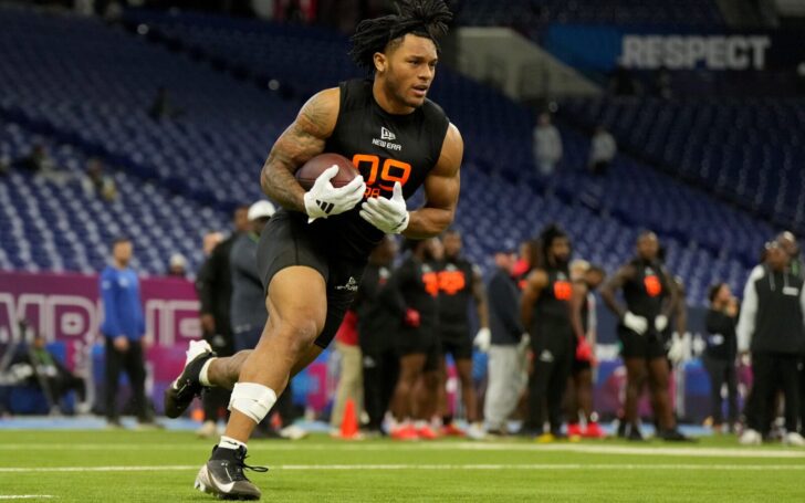 Omarion Hampton runs at the NFL Combine.