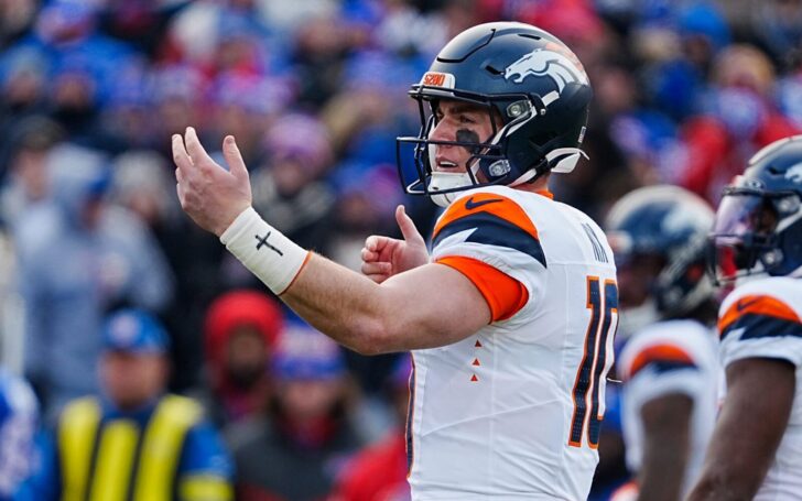 Bo Nix vs. Buffalo calling out a play to a receiver.