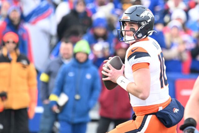 Bo Nix surveys the field against the Buffalo Bills in the playoffs, Jan. 2025.