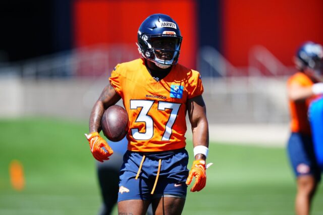 R.J. Harvey in Broncos rookie minicamp. He's wearing 37 and a helmet with "HARVEY" written on tape.