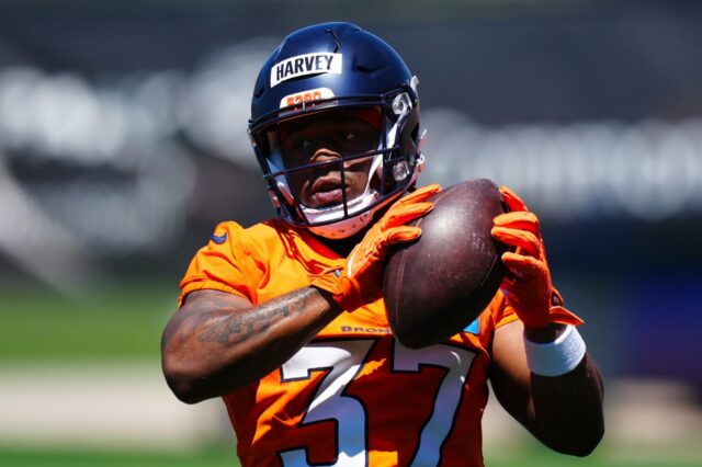 R.J. Harvey catches a pass in Broncos rookie minicamp in May.