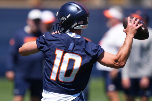 Bo Nix in June minicamp wearing the Broncos Blue jersey to designate that players can't hit him. There's no Broncos logo on the helmet.