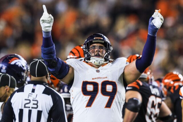 Zach Allen celebrates a sack on Joe Burrow in 2024.