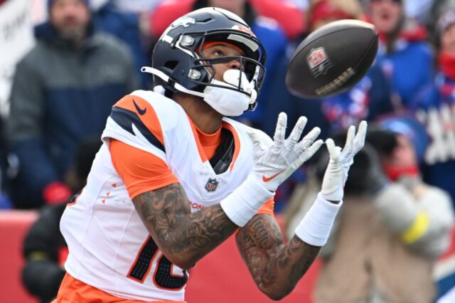 Troy Franklin hauls in a long touchdown from Bo Nix in the playoff game against the Bills in January, 2025.