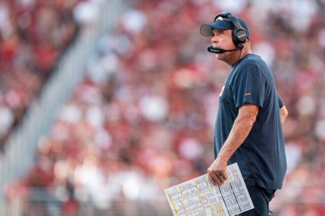 Sean Payton on the sideline with his play sheet in August against the 49ers.